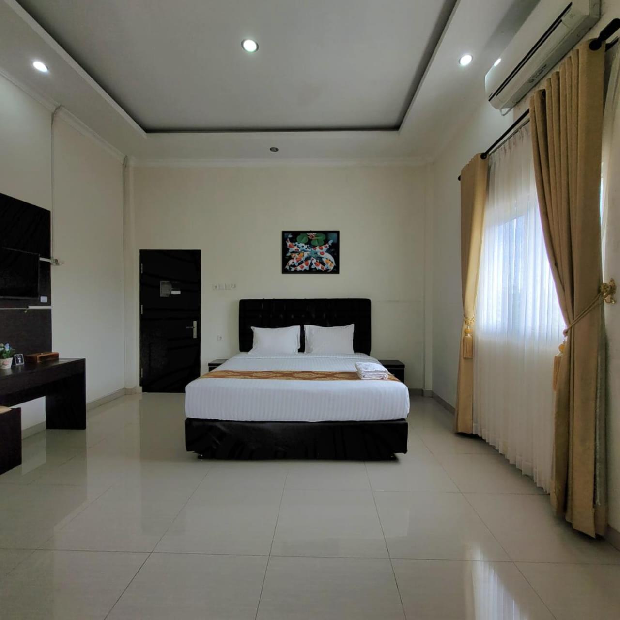 Mahakam Guest House Παντάνγκ Δωμάτιο φωτογραφία